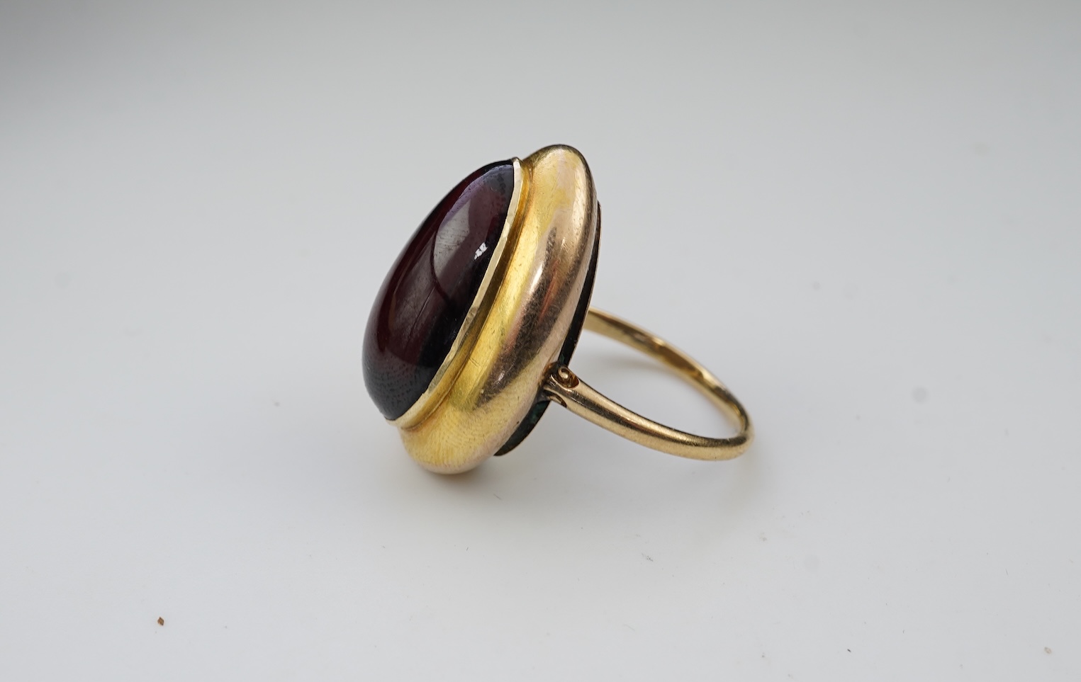 An unusual garnet locket ring, late 19th century composite